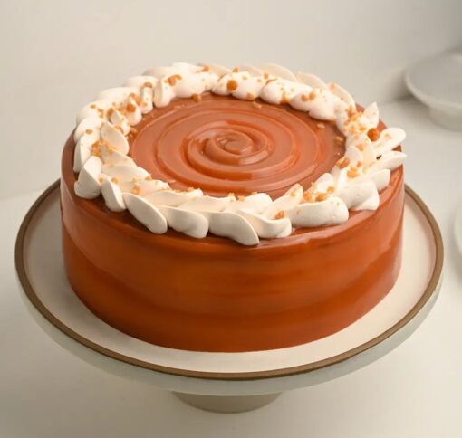 Butterscotch Temptation Cake with creamy butterscotch frosting and caramel drizzle.