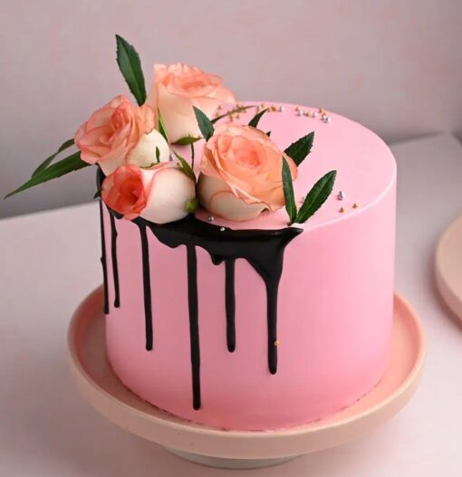 Pink Rose Elegance Cake with delicate pink rose decorations and smooth frosting.