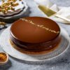 Belgian Velvet Chocolate Cheesecake with smooth chocolate layers and creamy cheesecake base.