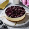 Blueberry Delight Cheesecake with fresh blueberry topping and creamy cheesecake layers.