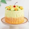 Pineapple Paradise Cake with tropical pineapple slices and creamy frosting.