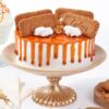 Lotus Caramel Dream Cake with creamy caramel frosting and Lotus Biscoff cookie crumbs.