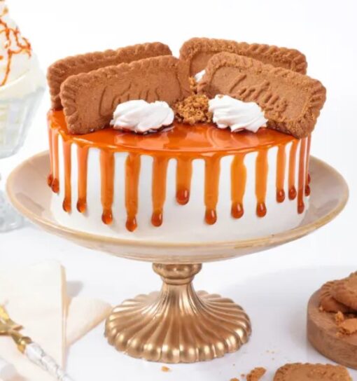 Lotus Caramel Dream Cake with creamy caramel frosting and Lotus Biscoff cookie crumbs.