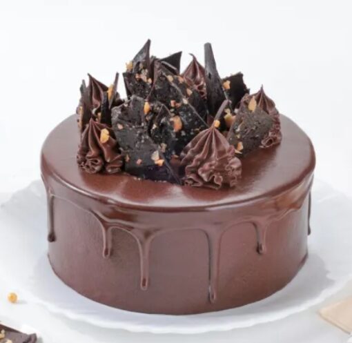 Hazelnut Crunch Cake with crunchy hazelnut toppings and creamy frosting.