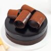 Ultimate Dark Chocolate Cake with moist layers and glossy dark chocolate frosting.