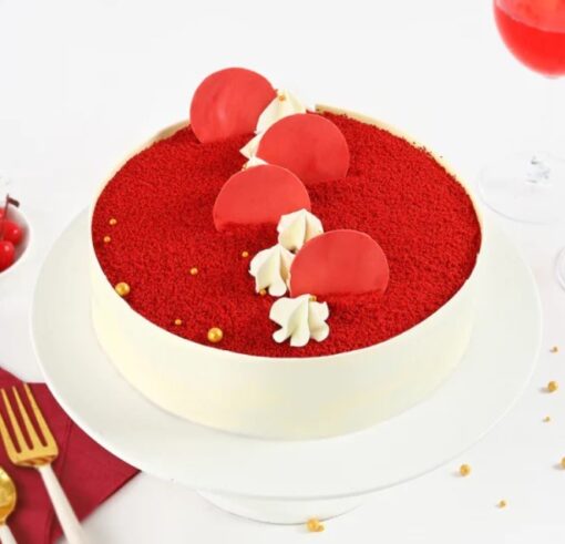 Red Velvet Celebration Cake with cream cheese frosting and vibrant red layers.