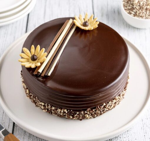 Dutch Chocolate Truffle Cake with smooth ganache and rich truffle frosting.