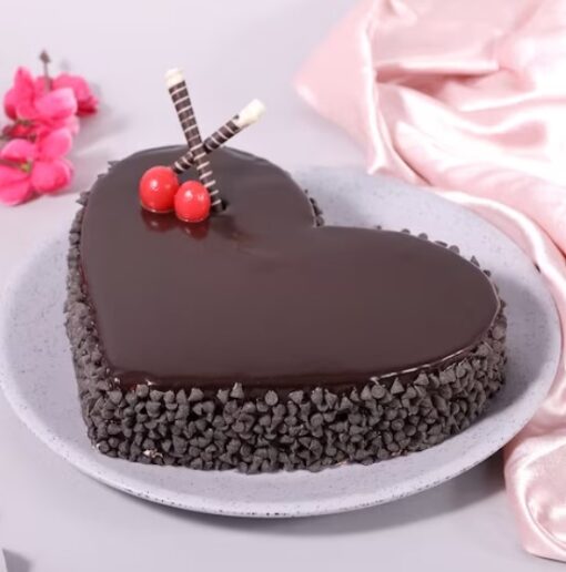 Decadent Truffle Heart Cake with smooth chocolate truffle frosting and heart-shaped design.