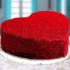 Red Velvet Heart Cake with creamy frosting and heart-shaped decoration.