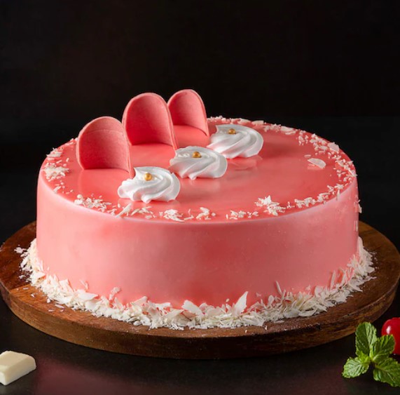 Decadent Rich Fudge Cream Cake with Creamy Chocolate Frosting Rich Fudge Cream Cake with smooth fudge frosting and chocolate shavings.