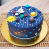 Galaxy Fondant Cake decorated with vibrant space-themed colors and star patterns, perfect for cosmic celebrations.