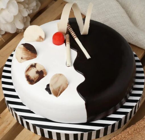 Vanilla Choco Cherry Fantasy Cake with creamy layers and cherry topping