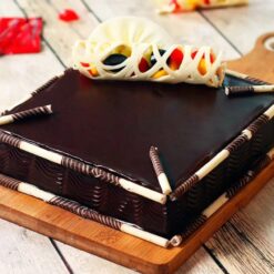 Square Chocolate Fruit Delight – moist chocolate cake topped with fresh fruits