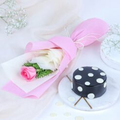 Pink Petals & Cocoa Indulgence gift combo with fresh pink roses and decadent chocolate truffle cake